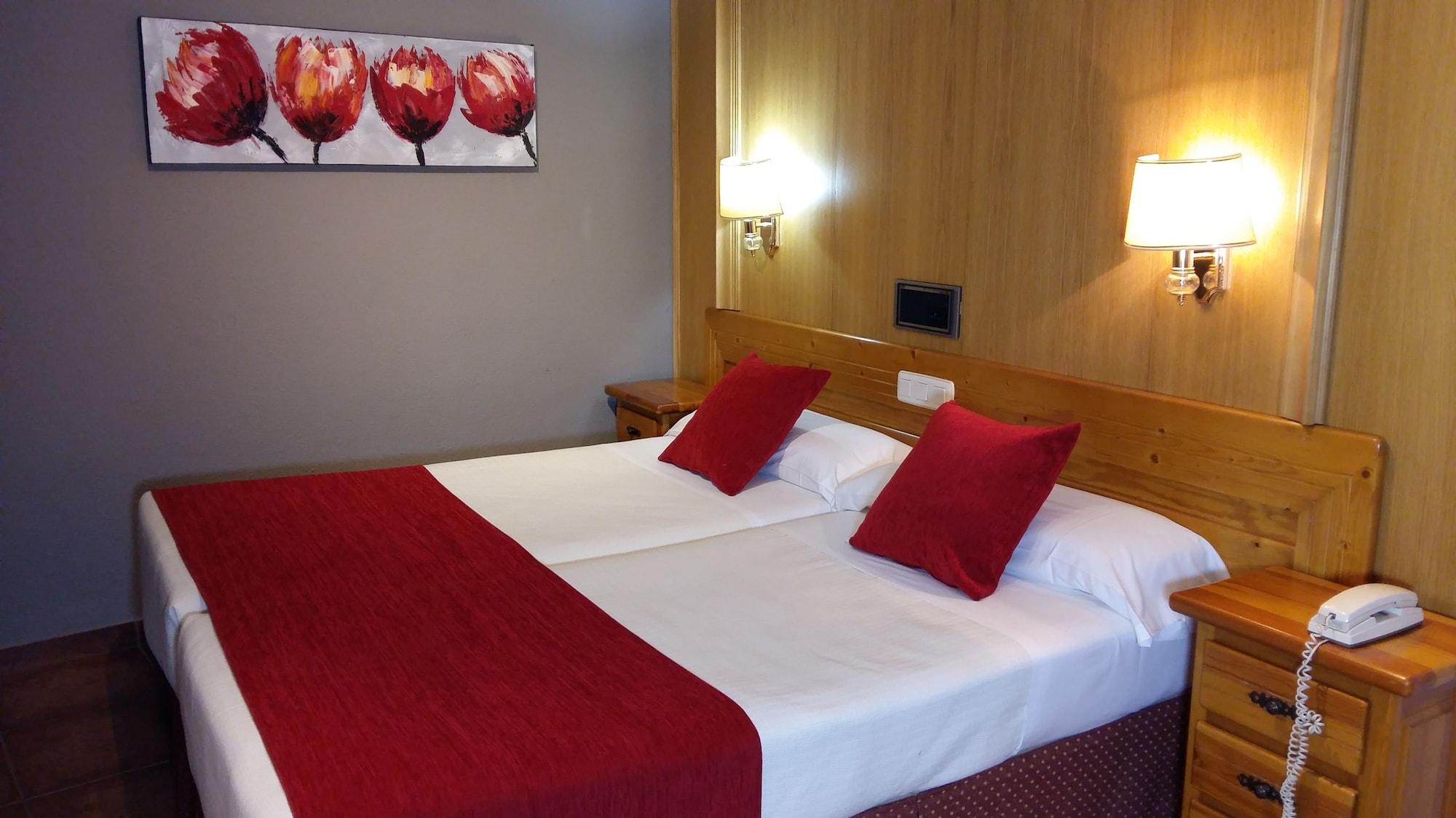 Real De Hotel